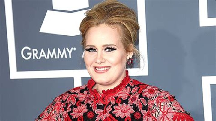 Adele Dances In A Maxi Dress, Swims In The Ocean & More In Never-Before-Seen Pics