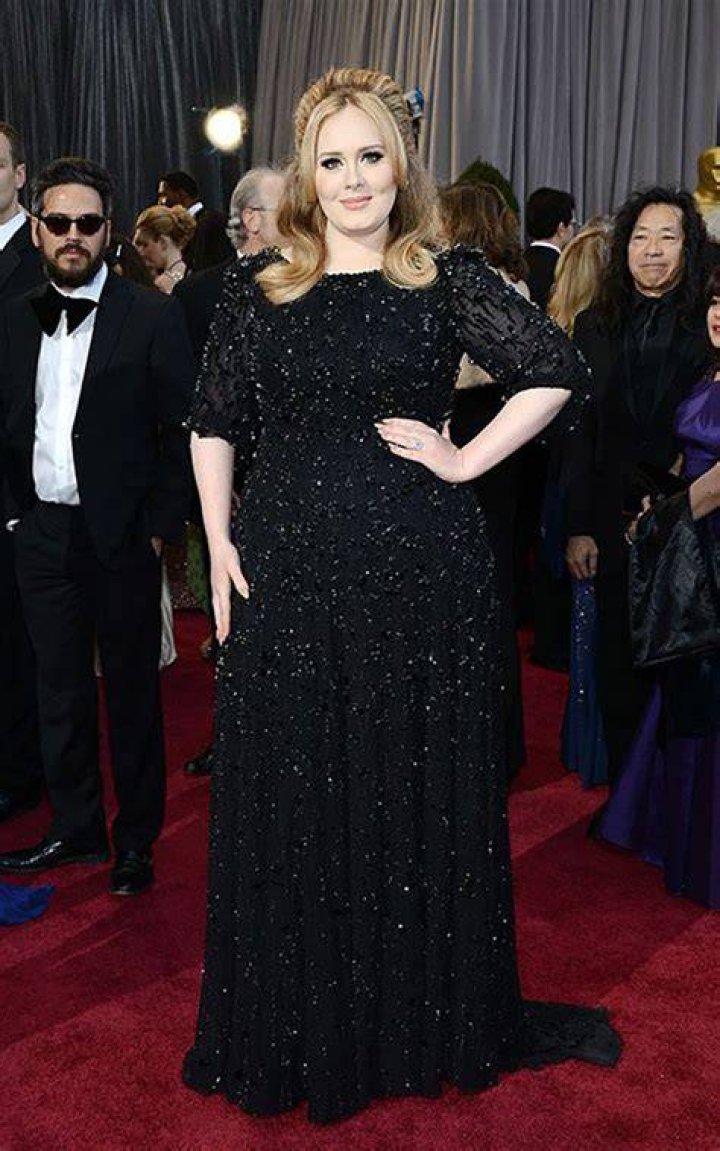 Adele Shows Off Incredible Figure In Festive Gown At Her Christmas Party