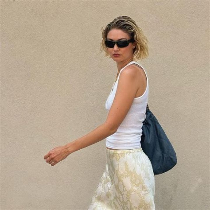 Bella Thorne Competes To Be Daisy Dukes Queen In Tiny Cutoffs & Red Turtleneck — See Pics