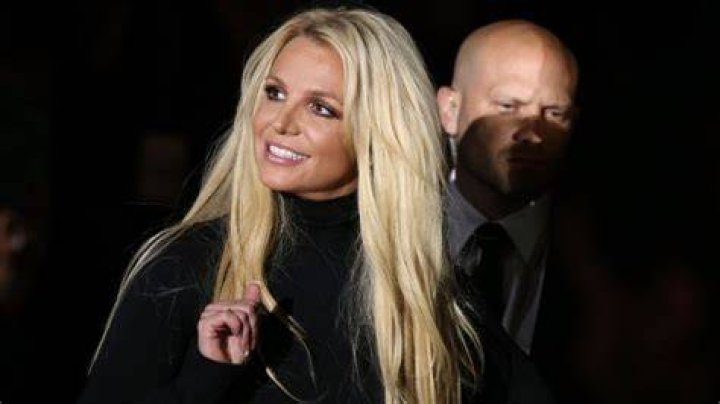 Britney Spears White Lingerie & Plunging Red Bodysuit In Dance Video – Hollywood Life