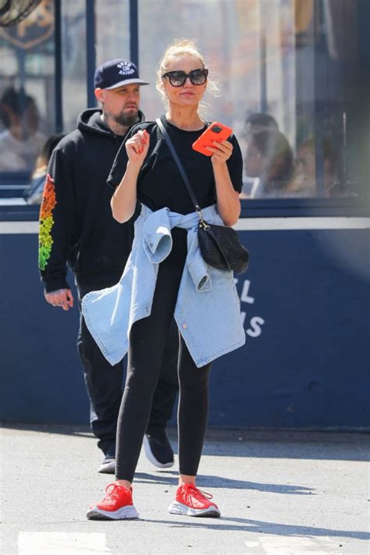 Cameron Diaz Rocks Black T-Shirt & Leggings During Rare Outing With Husband Benji Madden