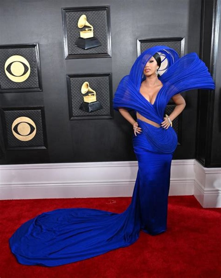Cardi B Fires Back After Fans Claim Travis Scott Should’ve Won Her Grammy: ‘Every Song Went Platinum’