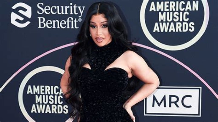 Cardi B’s Blue Satin Bikini & Cutout Furry Boots: Photos – Hollywood Life
