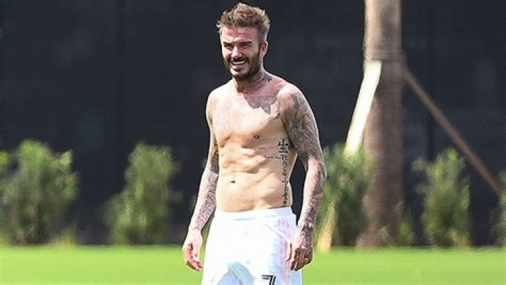 David Beckham Goes Shirtless While Walking The Dogs With Victoria – Hollywood Life