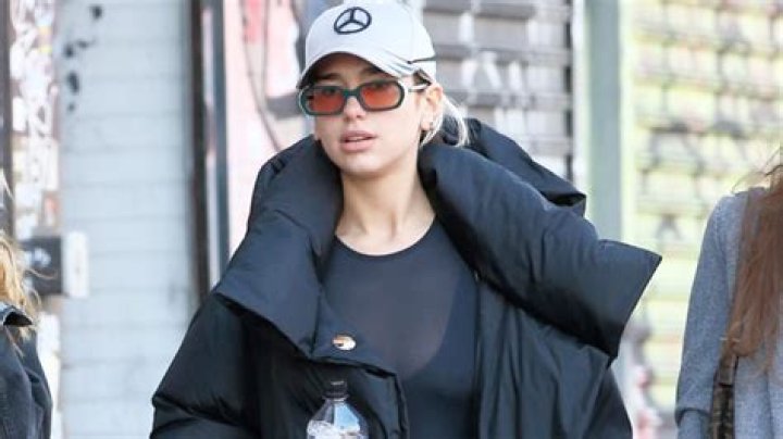 Dua Lipa Does A Headstand As She Shows Off Impressive Yoga Skills In Crop Top & Leggings