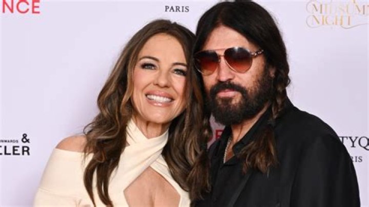 Elizabeth Hurley, 54, Transforms Into A Sexy Ninja & Strikes A Bunch Of Fierce Poses