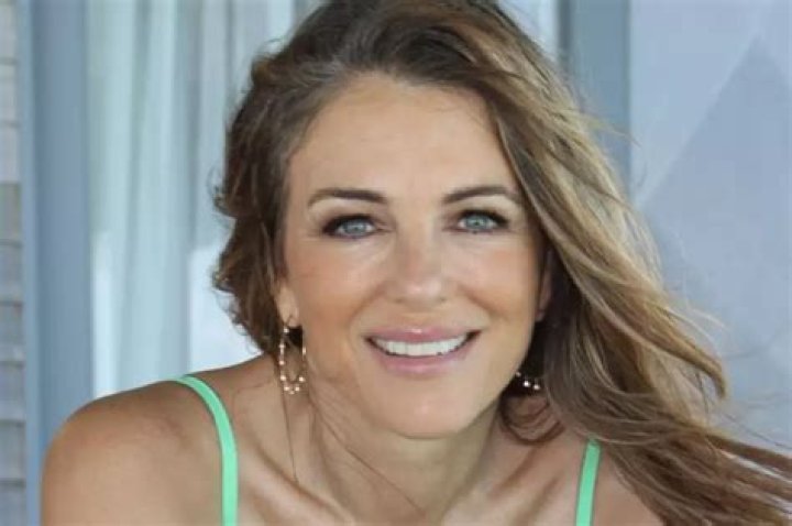 Elizabeth Hurley, 57, Rocks Tiny Peach Bikini In Sexy New Photos
