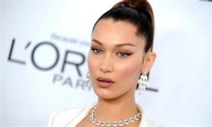 Hailey Baldwin & Bella Hadid Slip Into Animal Print Bikinis While On Italian Getaway