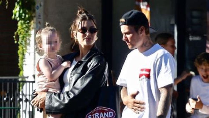 Hailey Bieber Snuggles Niece Iris With Justin In New Photos – Hollywood Life