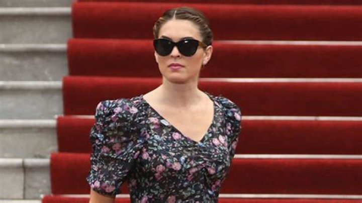 Hope Hicks Dresses Up in Flirty Florals With Melania Trump Nowhere In Sight