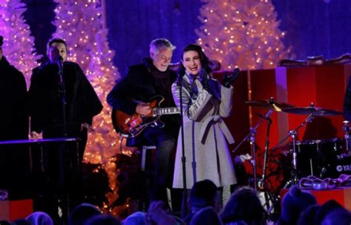 Idina Menzel Belts Out ‘Holly Jolly Christmas’ At Tree Lighting Event