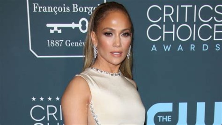 Jennifer Lopez Glows In High-Neck White Gown While Hosting Christmas Eve Party