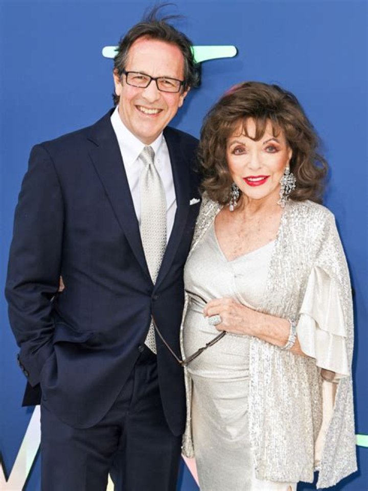 Joan Collins Stuns In White Swimsuit In New Pool Photo With Husband – Hollywood Life