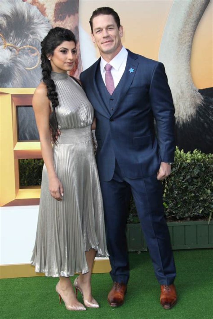 John Cena’s Wife Shay Shariatzadeh Sweetly Holds On To Him During Rare Outing — Pic
