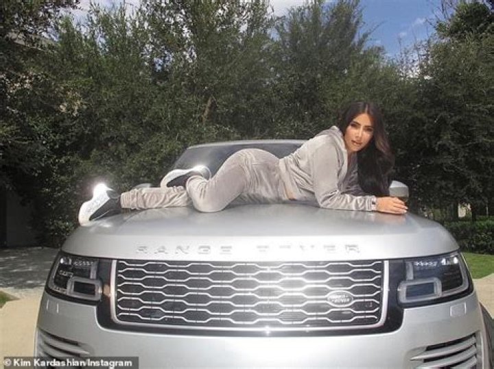 Kim Kardashian Recreates Iconic 2007 Photo On The Hood Of Her Range Rover In Velour Tracksuit