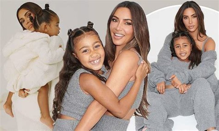 Kim Kardashian Rocks Sexy Cut Out Top As She Snuggles With Daughters North, 7 & Chicago, 2, On Vacation