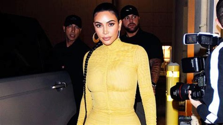 Kim Kardashian’s Tight Yellow Dress, Long Braid & Hoops – Pics – Hollywood Life