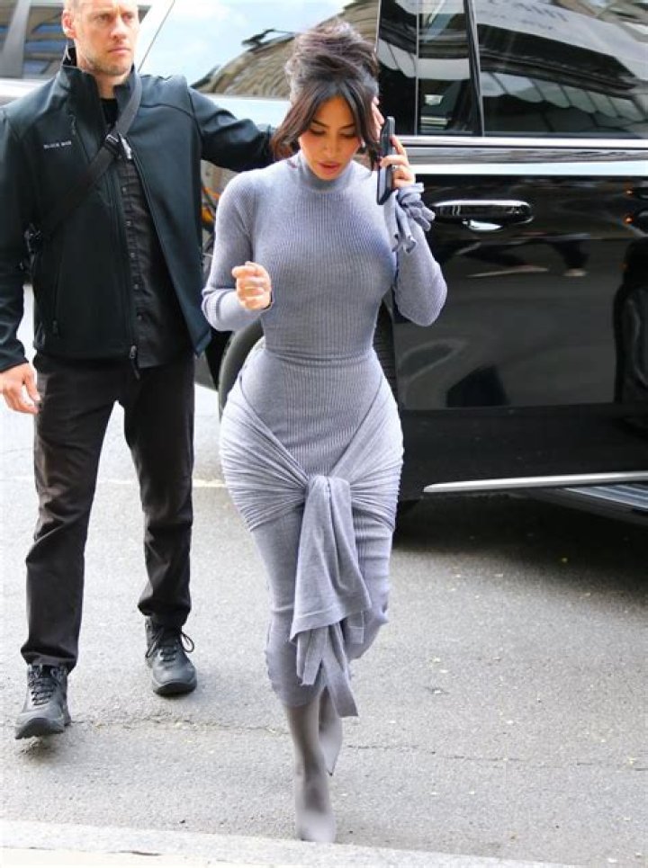 Kim Kardashian Takes A Dip In Strapless Silver Bikini As She Enjoys A Throwback ‘Lazy Sunday’: Photo