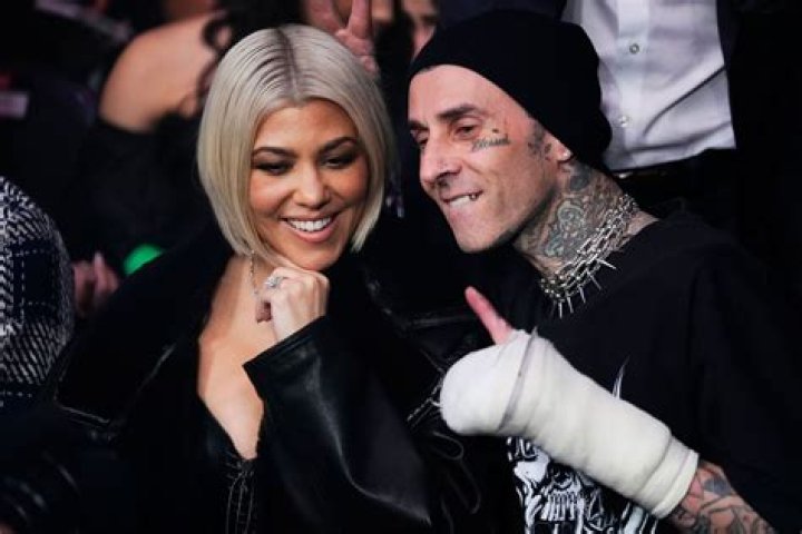 Kourtney Kardashian Jumps Into Travis Barker’s Arms After Blink 182 Reunites At Coachella: Video