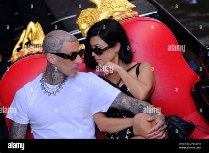 Kourtney Kardashian Sits on Travis Barker’s Lap As They Cozy Up For a Gondola Ride In Venice