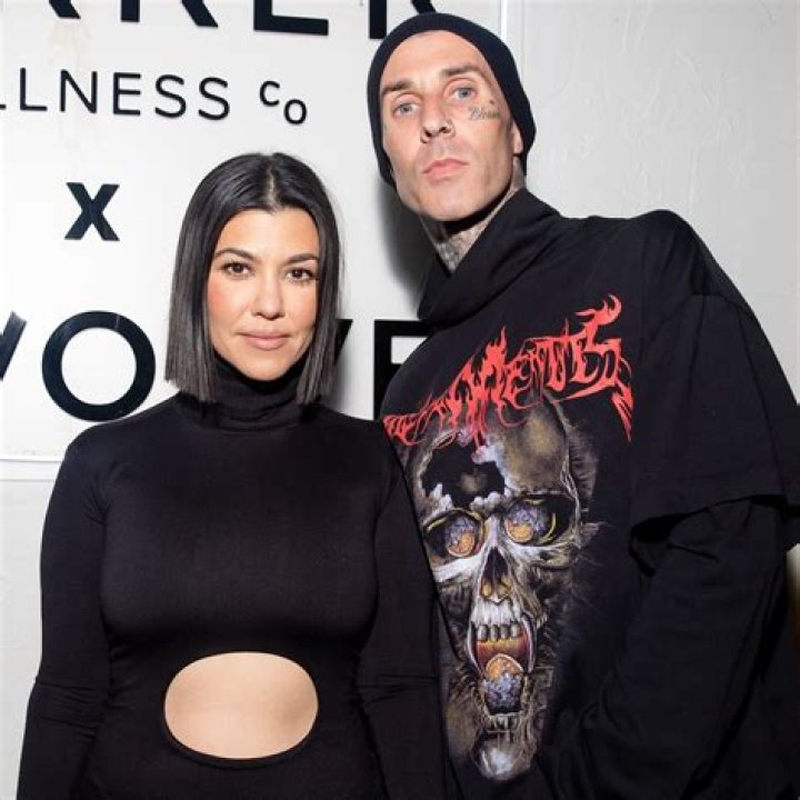 Kourtney Kardashian Sweetly Hugs Travis Barker In New BTS Photos Of MGK’s Tour