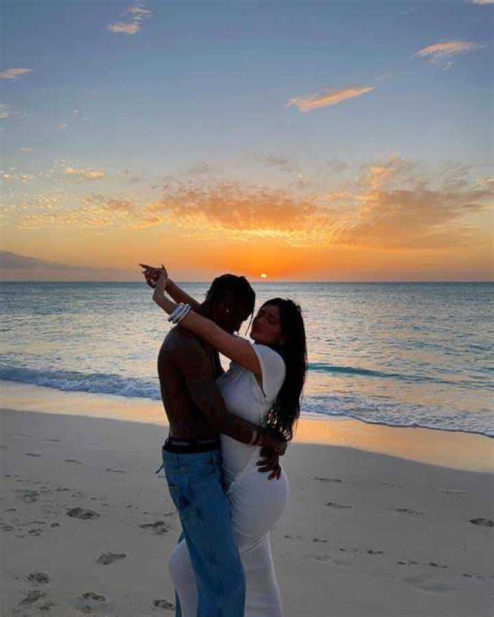 Kylie Jenner & Shirtless Travis Scott Share Romantic Sunset Embrace On The Beach: Photos
