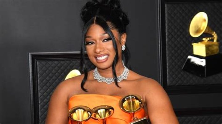 Megan Thee Stallion Dances In A Sparkling Orange Bikini & Ignores Haters After Grammys