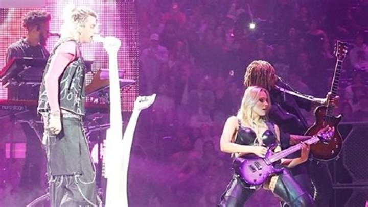 MGK Rocks Out With Guitarist Sophie Lloyd After Megan Fox Is Seen Without Engagement Ring