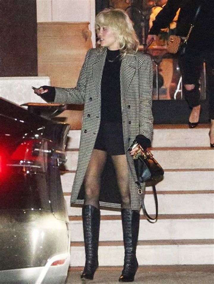 Miley Cyrus in Shorts & Knee High Boots – Photos – Hollywood Life