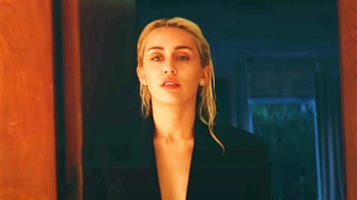 Miley Cyrus Stretches In Tiny Red Bikini In Sexy New Photo – Hollywood Life
