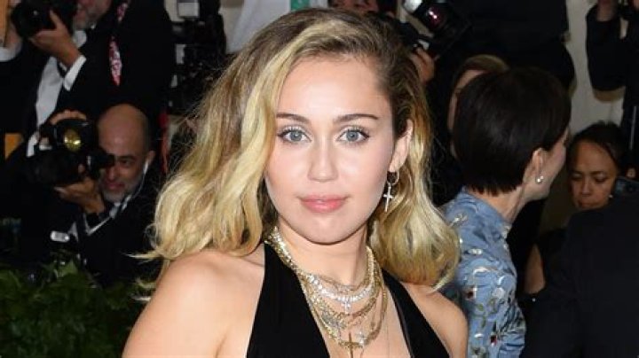 Miley Cyrus Wipes Out Like A ‘Floppy Fish’ While Attempting To Wakeboard — Watch