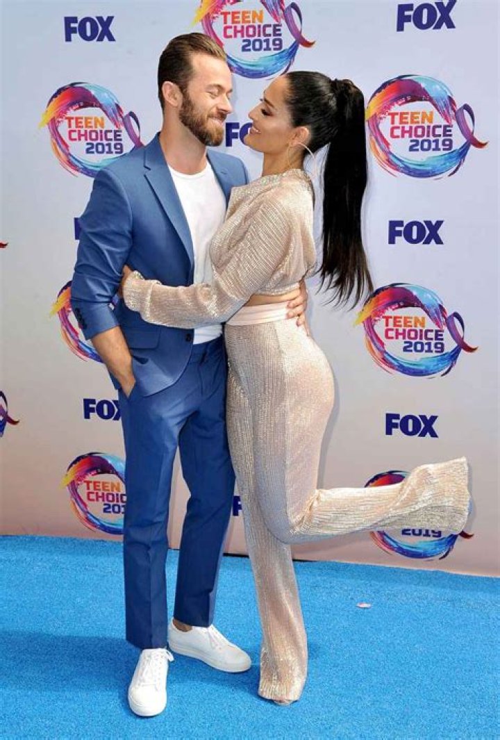 Nikki Bella Bares Her Baby Bump For ‘Savage’ TikTok Video With Artem Chigvintsev