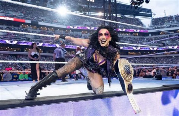 Pics Of The WWE Superstar & Women’s Champ – Hollywood Life