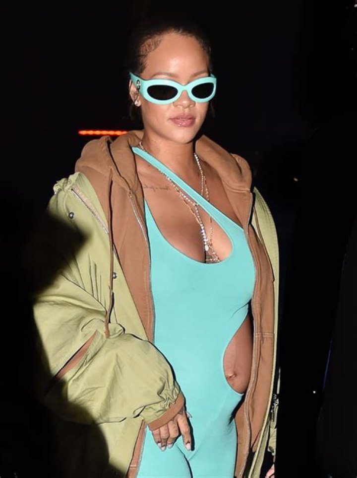 Pregnant Rihanna Shows Off Bump In Neon Aquamarine Cutout Catsuit Paris Fashion Week — Photos