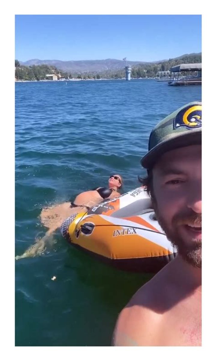 Pregnant Stassi Schroeder Shows Off Her Baby Bump While Swimming In A Lake — Watch