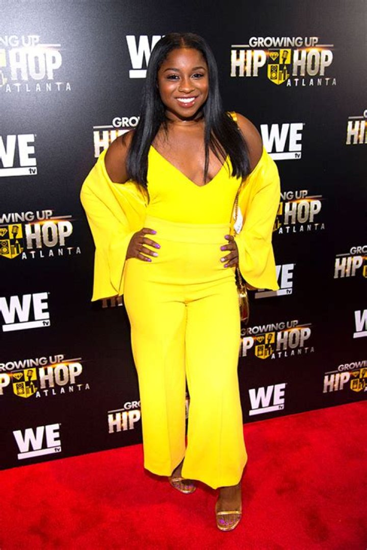 Reginae Carter Slays In Plaid Short Shorts & Matching Blazer While Dancing Along To Her New Song — Watch