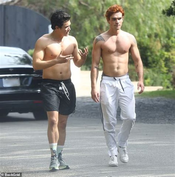 ‘Riverdale’ Star Charles Melton Shares Sexy Pic & Mark Consuelos Asks Him If He’s Using A Kylie Jenner Lip Kit
