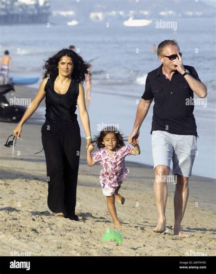 Salma Hayek, 54, Looks Incredible In Red Swimsuit While Hitting The Pool With Husband & Daughter, 13