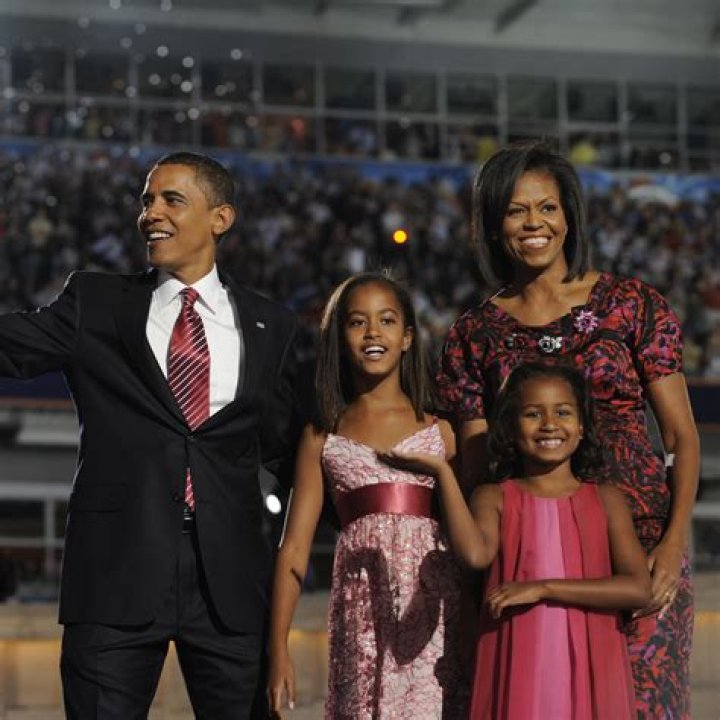 Sasha & Malia Obama Wear Adorable Bright Coats For Dad’s Inauguration