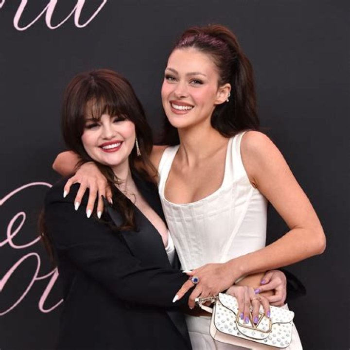 Selena Gomez Rocks Dramatic Dark Lips, Giant Hoops & New Bangs At NYC Album Party – Pics
