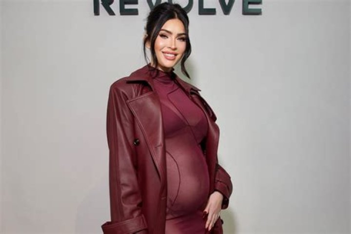 Shows Off Baby Bump – Hollywood Life