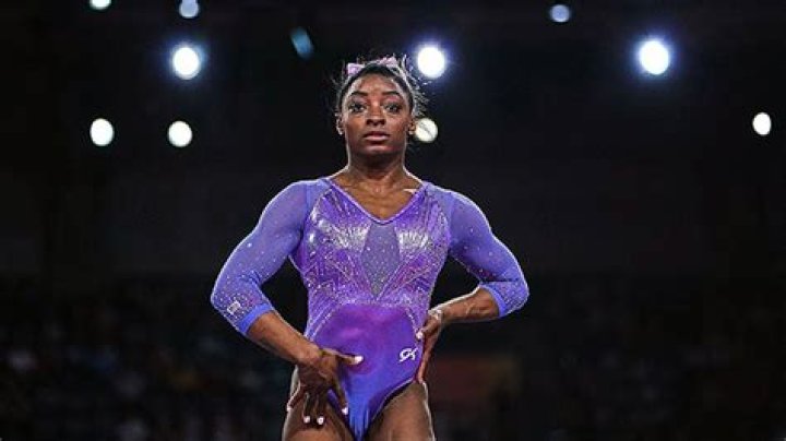 Simone Biles Wears Strapless Peach Swimsuit As She Poses On Tropical Beach: Photos