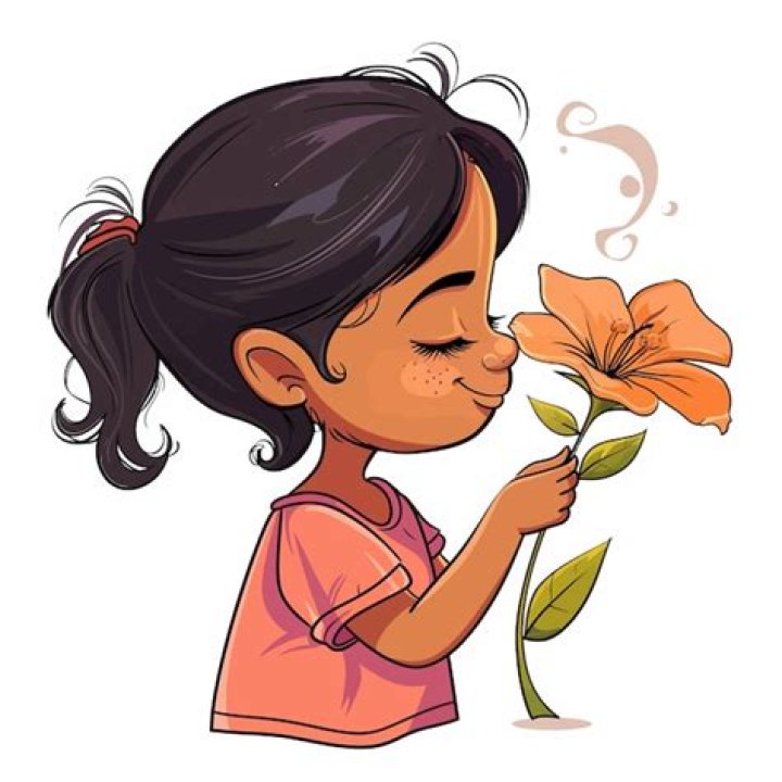 True Thompson, 2, Looks Adorable In Pink As She Wrinkles Her Nose To Smell A Flower